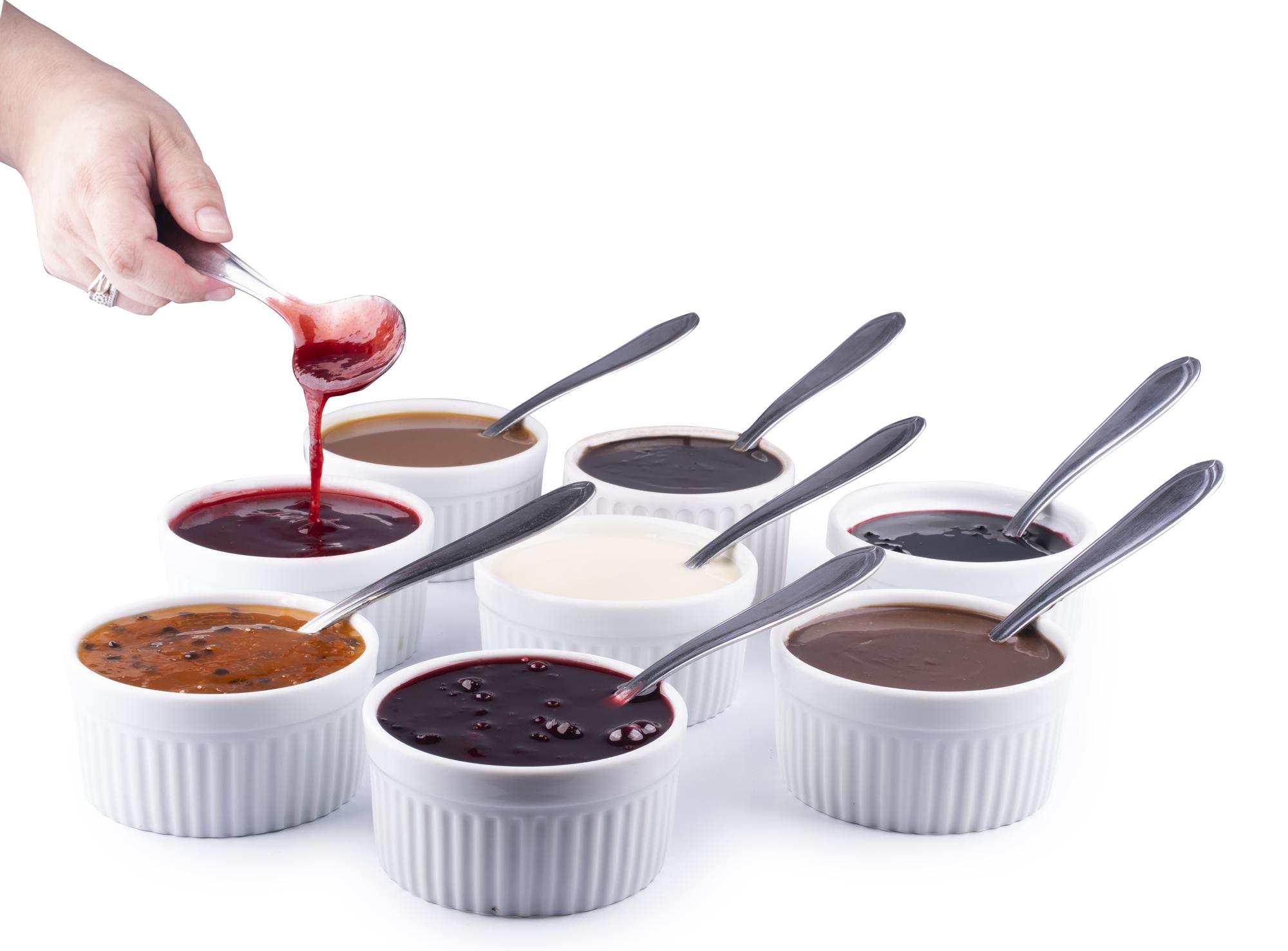 Workshop participants tasting a sauce